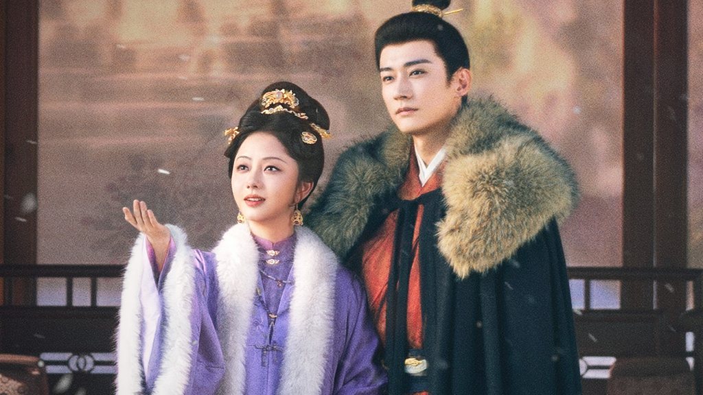 Tan Song Yun de roupa lilás com gola de pele branca e Liu Xue Yi de capa escura com gola de pele, lado a lado sob neve