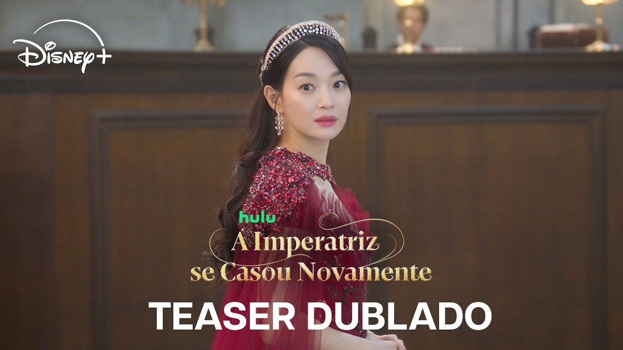 Shin Min-a como a imperatriz Navier, de vestido vermelho bordado e tiara, olhando para a câmera num salão de madeira escura, com o título A Imperatriz se Casou Novamente e a marca Disney+